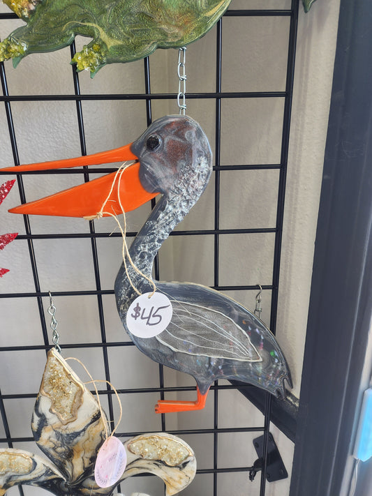 Gray and Orange Pelican